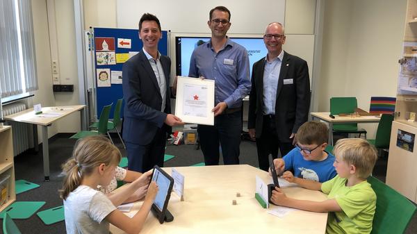 BildGrafik - �bergabe REGIONALE-Stern f�r DigiMath4Edu - 10.06.2019 - Manges, Torsten